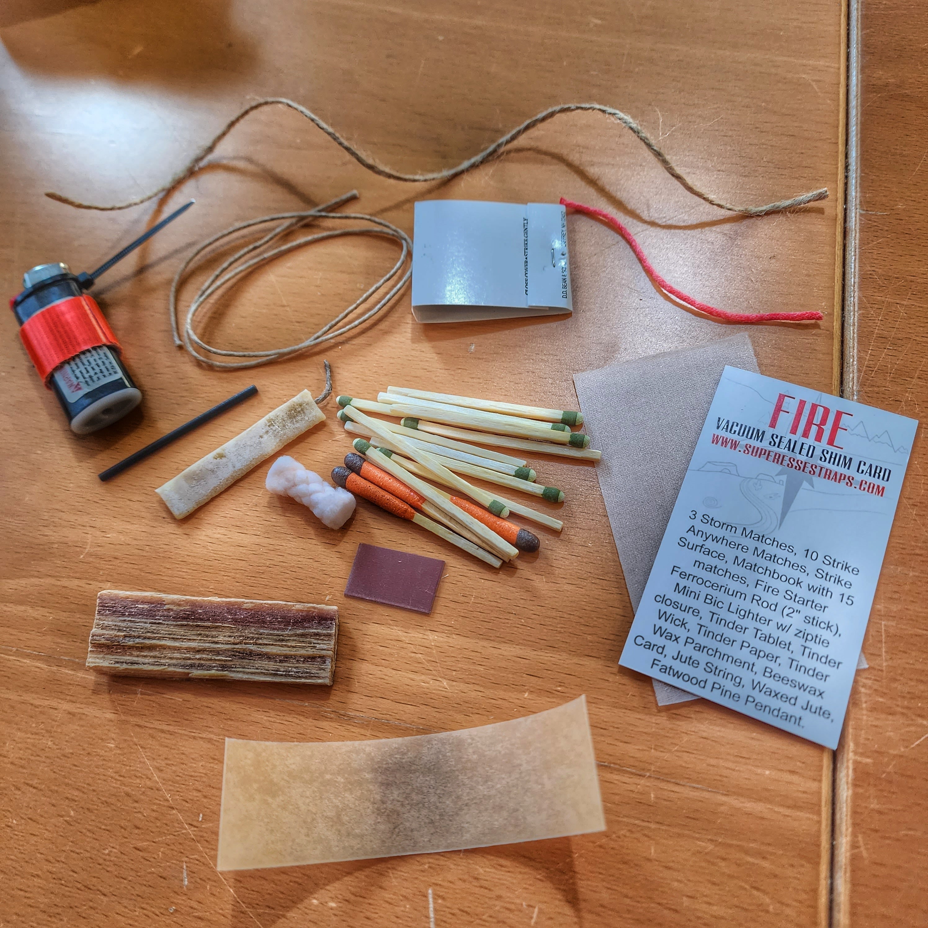 Survival Kit Lighter - Fire Starter outfitted with supplies.
