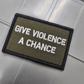 As Seen on Socials - Give Violence A Chance - 2x3 Patch - Olive Drab w/White