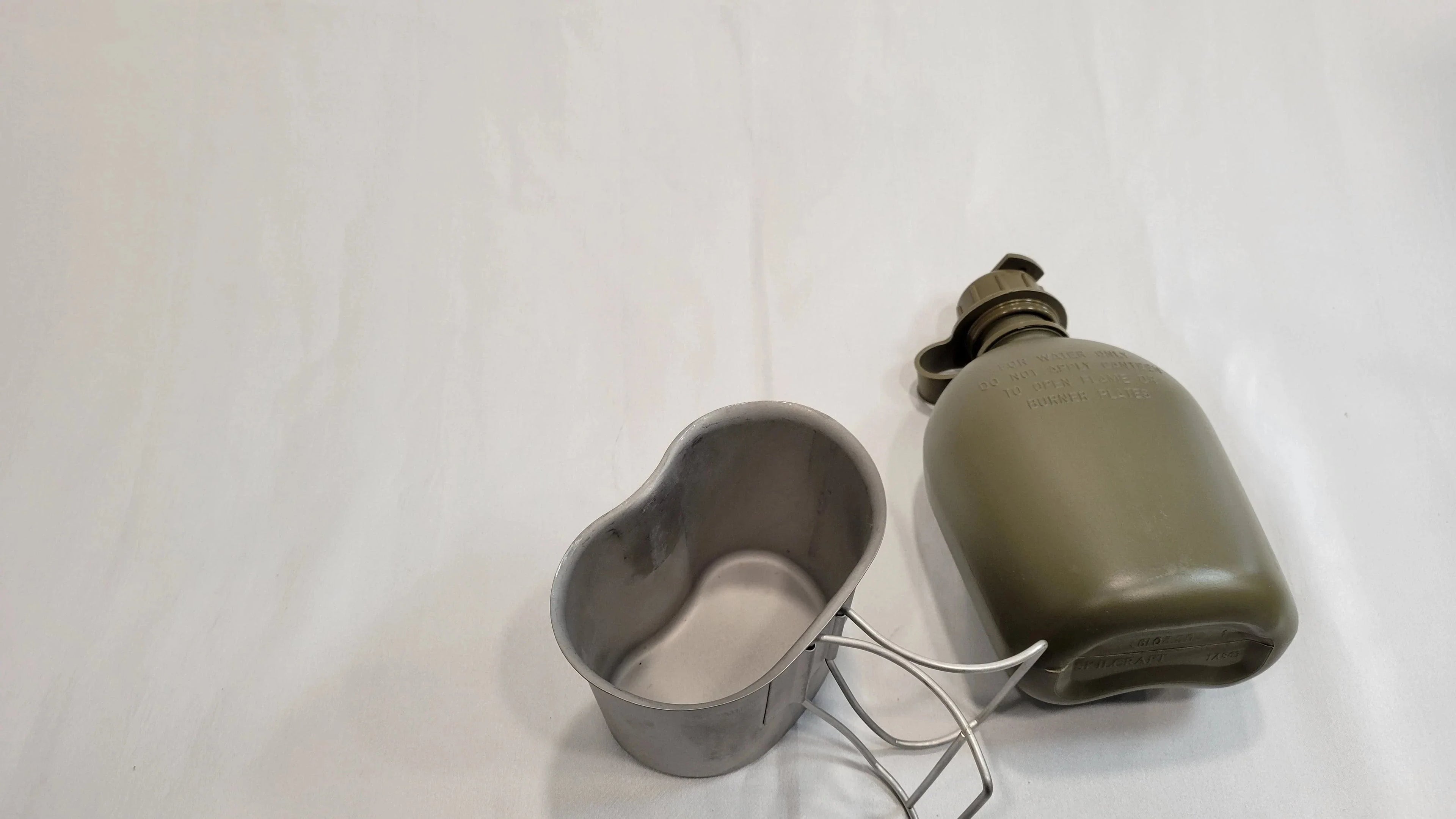 1 Qt Canteen, Cup, & Canteen Cup stove/stand package.